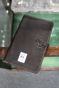 A leather wallet / case.