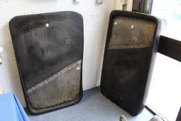 Two unusual hardwood and sheet metal applied sculptures.