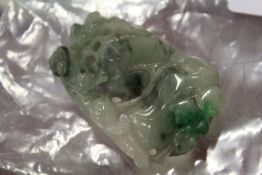 A Chinese carved jade pendant.