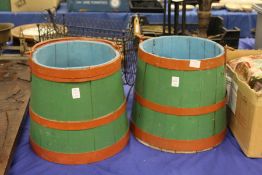 Two painted wood buckets.