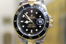 A gent's stainless steel wristwatch.