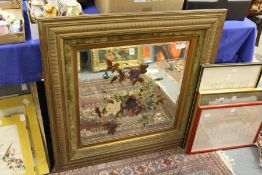 A decoratively painted mirror.