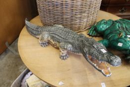 A good large painted pottery model of a crocodile.