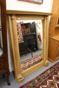 A large pine mirror.