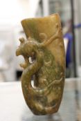 An unusual Chinese carved jadeite cup.