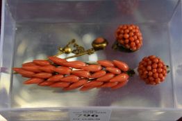 Coral jewellery to include a stick pin and brooch.