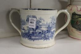 A blue and white transfer printed loving cup.