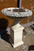 A good large classical style reconstituted stone pedestal urn on stand.