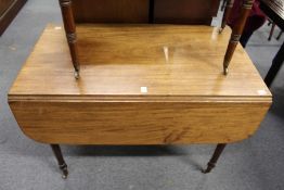 A Victorian mahogany Pembroke table.