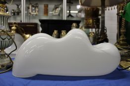 An unusual opaque glass light fitting.