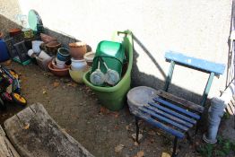 A quantity of garden effects to include terracotta plant pots etc.
