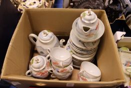 A Japanese egg shell tea service.