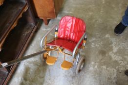 An unusual child's pull-along seat.