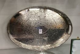 An engraved oval plated galleried tray.