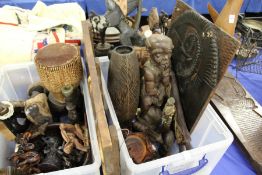A large quantity of carved wood items.