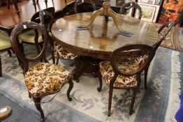 A set of six Victorian balloon back dining chairs.
