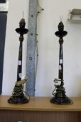 A pair of chinoiserie decorated lacquer table lamps.