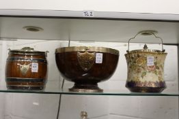 An oak biscuit barrel with plated mounts together with a similar salad bowl and a porcelain