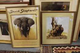 David Shepherd, a colour print of rhinoceroses, pencil signed, together with a colour print of a