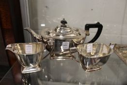 A three piece plated tea service.