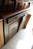 A Victorian walnut chiffonier.