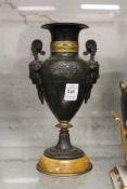 A spelter and marble classical style urn shaped vase.