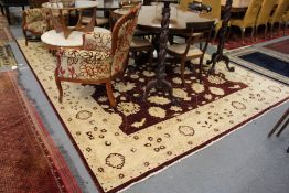 A good large red ground carpet with cream border.