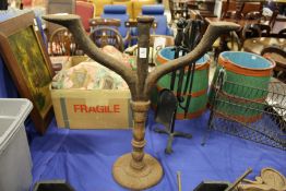 A cast iron cobbler's last.