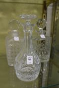 Two cut glass whisky decanters and a sherry decanter.
