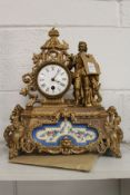 A 19th century French spelter mantle clock with Sevres style porcelain panel.
