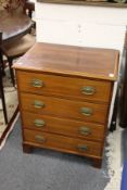 A small mahogany four drawer chest.