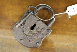 An old cast iron padlock and key.