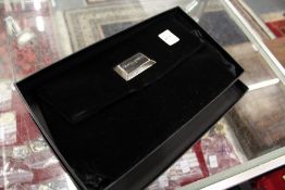 A Giorgio Armani velvet clutch bag, boxed.