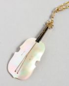 A decorative gilt metal and mother-of-pearl pendant and chain.