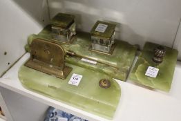 An onyx and brass desk set.