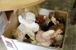 A quantity of modern porcelain dolls and other toys.