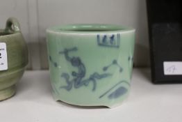 An oriental blue and celadon glazed tripod censer.