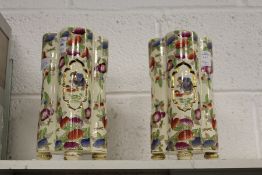 A pair of late 19th century earthenware vases in the Japanese taste.