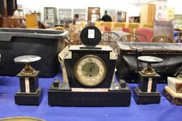 An Art Deco three piece clock garniture.