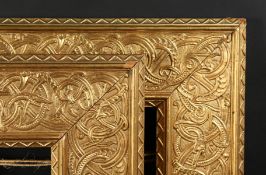 Two Early 20th Century Composition Frames with Swirling Decoration. 10.5