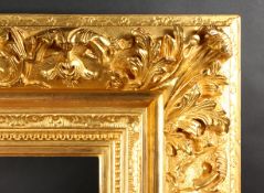 A 19th Century French Gilt Composition Frame with Scrolled Corners. 22
