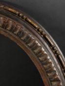 An 18th Century Carved and Moulded Oval Frame. 20.75