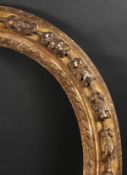 An 18th Century Carved Oval Frame, 22