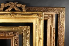 A 19th Century Ribbon Topped Frame with Scrolling Garlands, 28