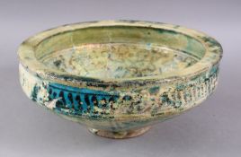 AN 12TH / 13TH CENTURY LARGE PERSIAN ISLAMIC TURQUOISE & BLACK CALLIGRAPHIC POTTERY BOWL, the bowl
