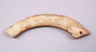 A GOOD WARRING STATES STYLE CARVED JADE HUANG PENDANT, of chilong form, 11cm.