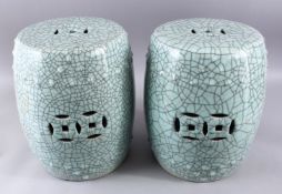 A GOOD PAIR OF 20TH CENTURY CHINESE CELADON CRACKLE GLAZED PORCELAIN GARDEN BARREL SEATS, with