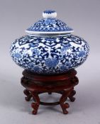 A CHINESE BLUE & WHITE PORCELAIN GINGER JAR, COVER & HARDWOOD STAND, The vessel decorated with