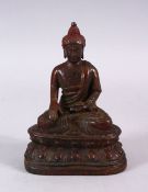 A CHINESE TIBETAN BRONZE FIGURE OF A SEATED BUDDHA, with traces of lacquer, seated upon lotus,