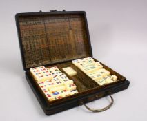 A CHINESE LEATHER STYLE MAHJONG DRAGON GAMES SET, with decoration of a dragon and incomplete ,